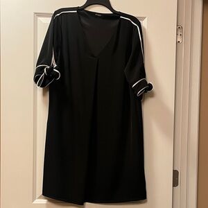 Chic Black Dress with White Trim